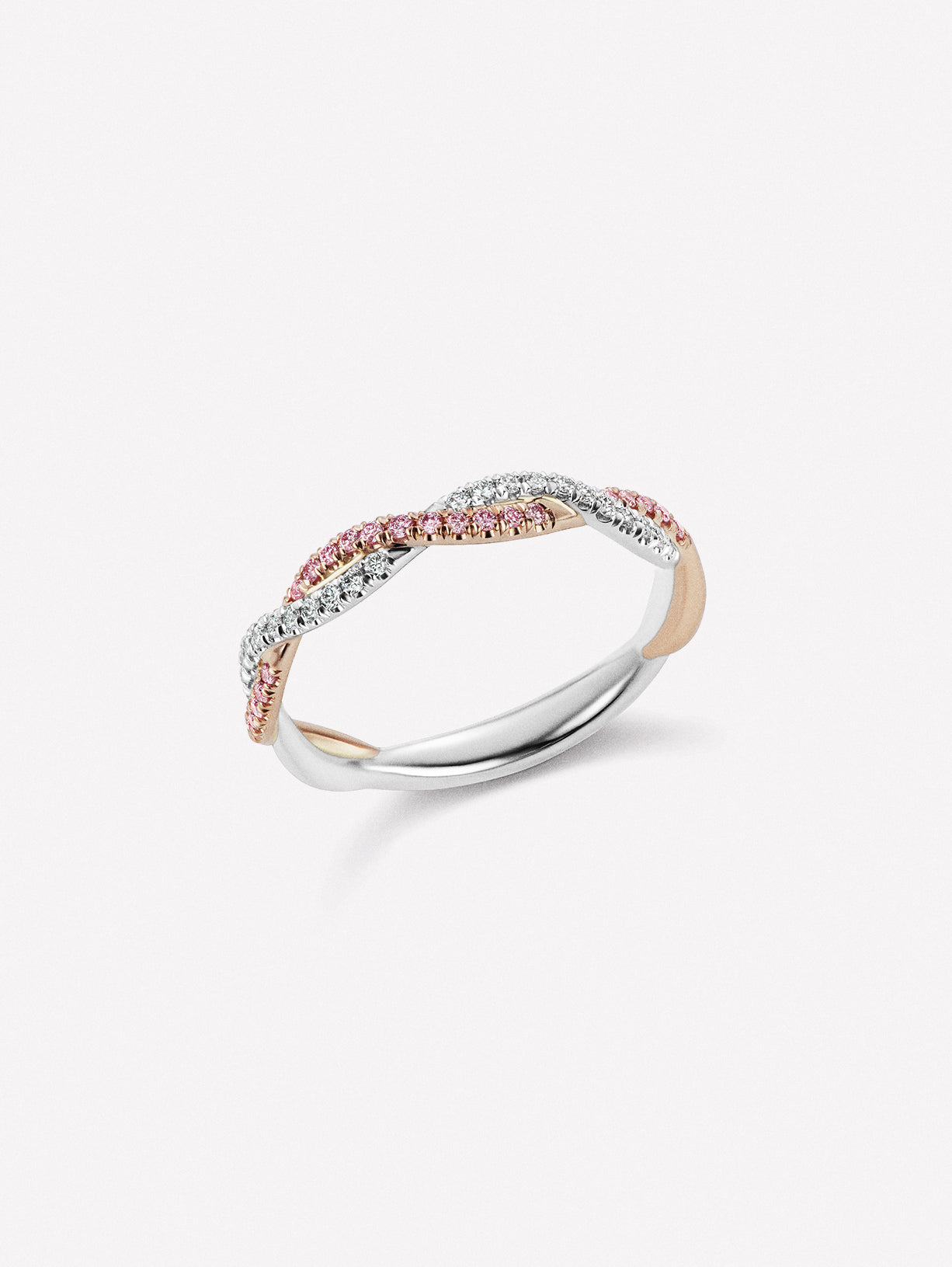 Popular Pink diamond and white diamond ring in braided band design by J F I N E.