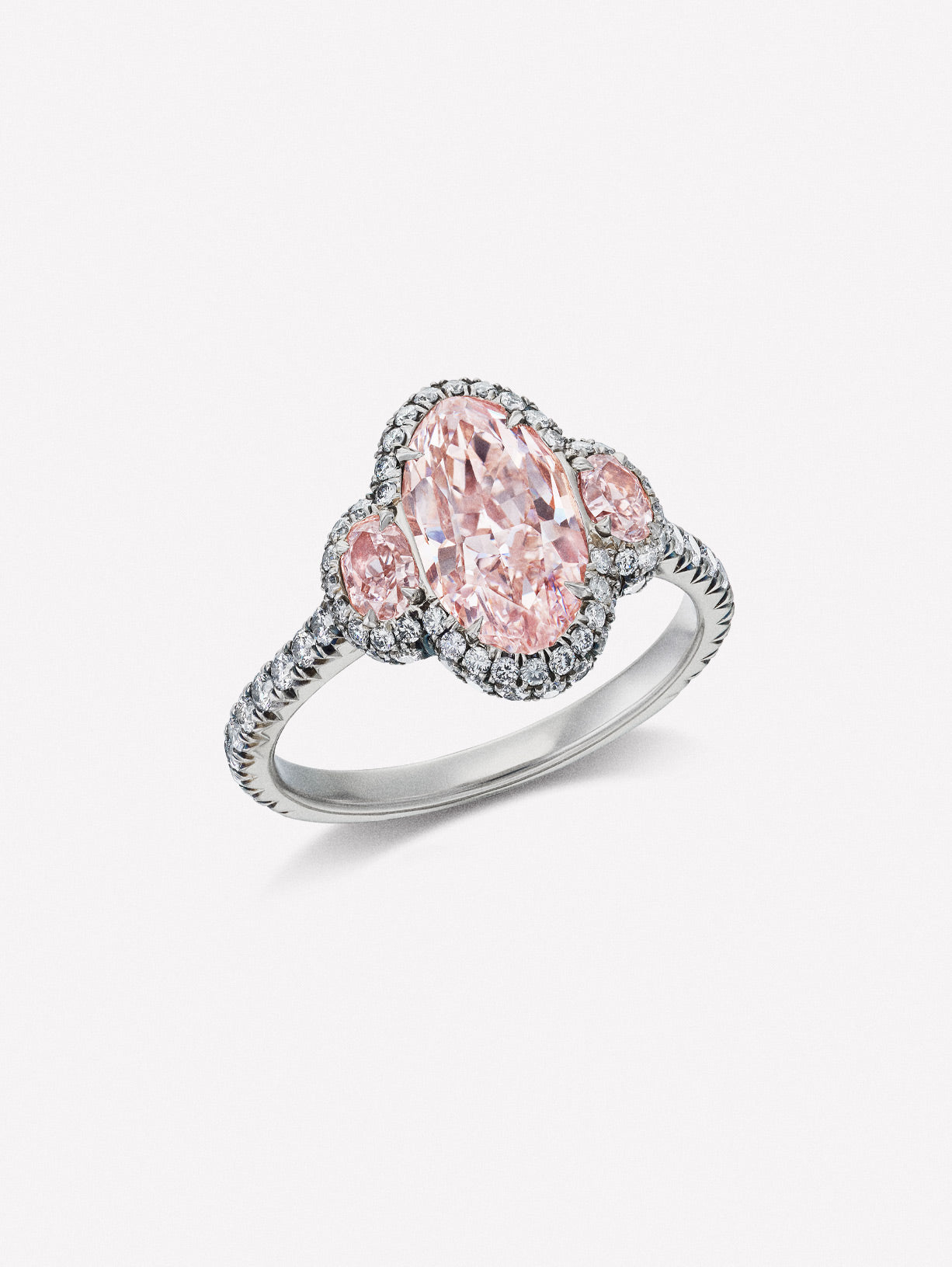 Fancy Orangy Pink Cushion Diamond Three Stone Ring