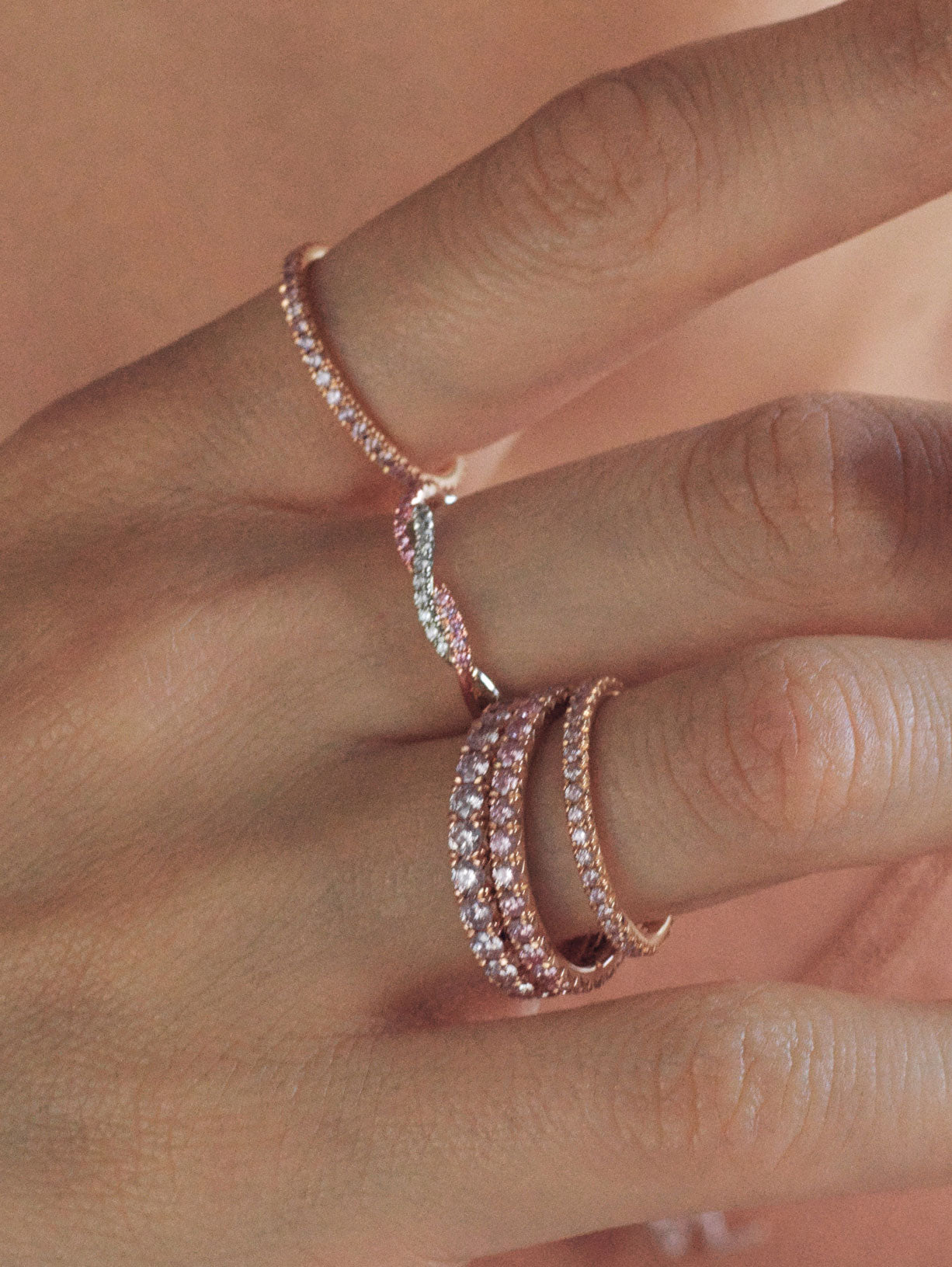 Model wearing argyle pink diamond bands and JFINE braided pink diamond band