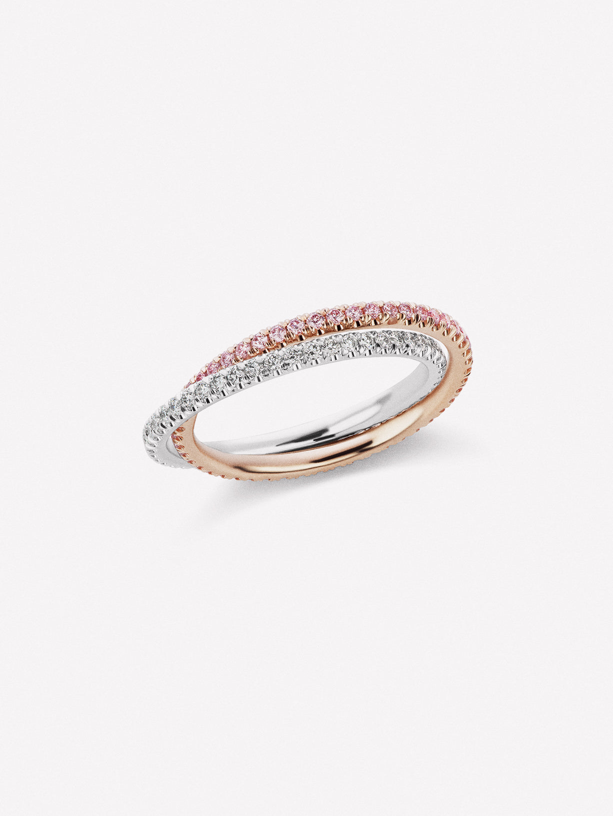 PInk diamond and white diamond bands intertwined, and can move independently of each other. 